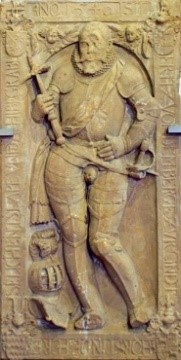 Steinrelief an der Mauritius Kirche von Hittfeld, Wikipedia, gemeinfrei