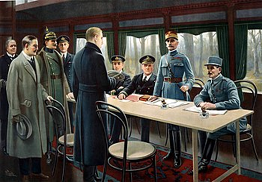 Wikipedia, Waffenstillstandabkommen, Die Unterzeichnung des Waffenstillstandsabkommens - Gemälde von Maurice Pillard Verneuil. - V. r.: Hinter dem Tisch die franz. Generäle Maxime Weygand und Marschall Ferdinand Foch (stehend) sowie die brit. Admiräle Rosslyn Wemyss und George Hope; davor stehend der deut. Delegationsleiter Matthias Erzberger, Generalmajor Detlof von Winterfeldt, Alfred von Oberndorff (Auswärtiges Amt); hinten die Kapitäne Jack Marriott (brit.), Ernst Vanselow (ganz links).