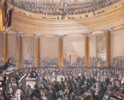 Bild gemeinfrei Zeitgenössische Lithografie der Nationalversammlung in der Paulskirche Erstellt: 1. Januar 1848 Sitzungssaal der Frankfurter Nationalversammlung (mit verschiedenen politischen Gruppierungen)